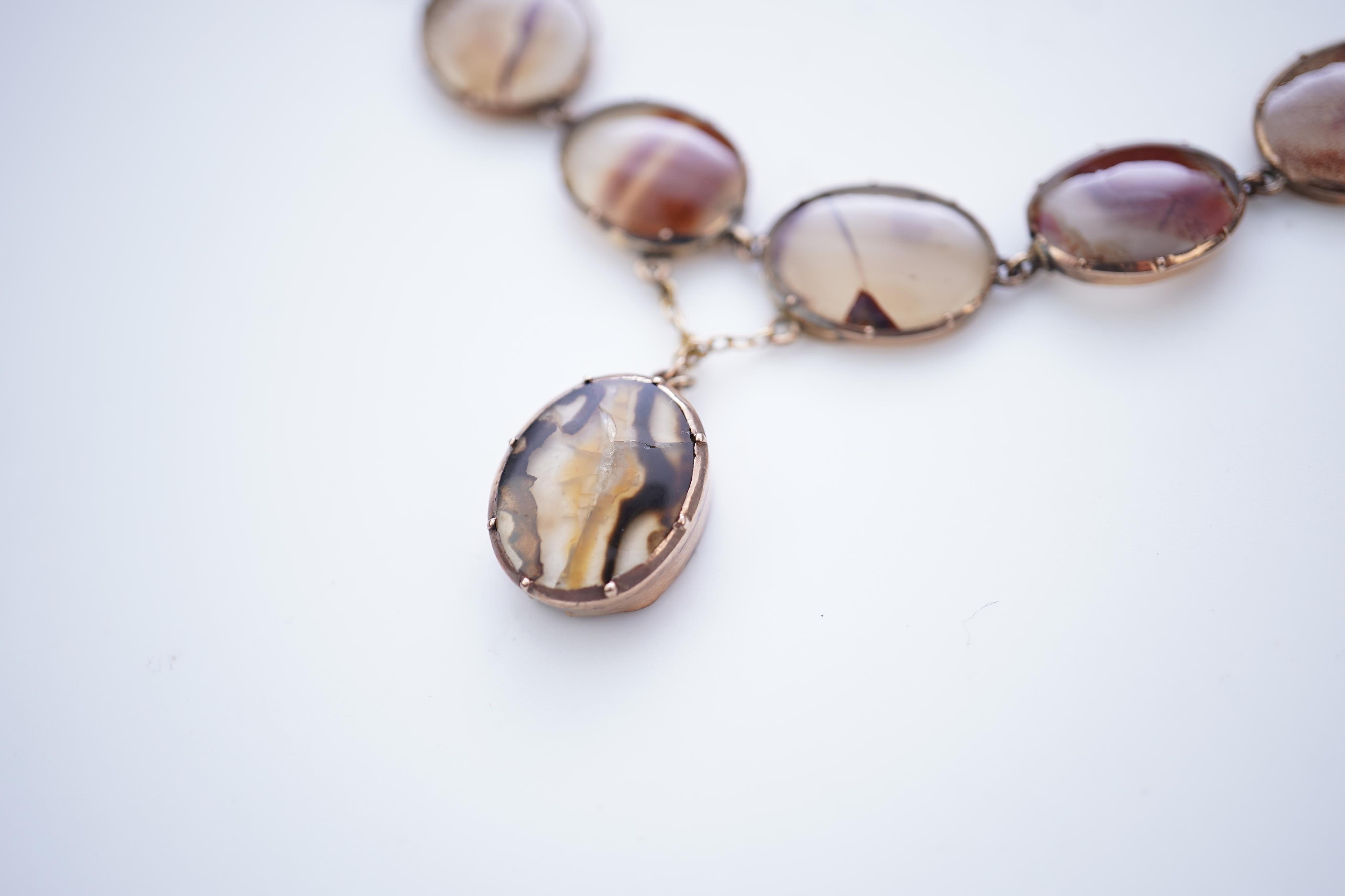 A Georgian agate necklace, early 19th century and later